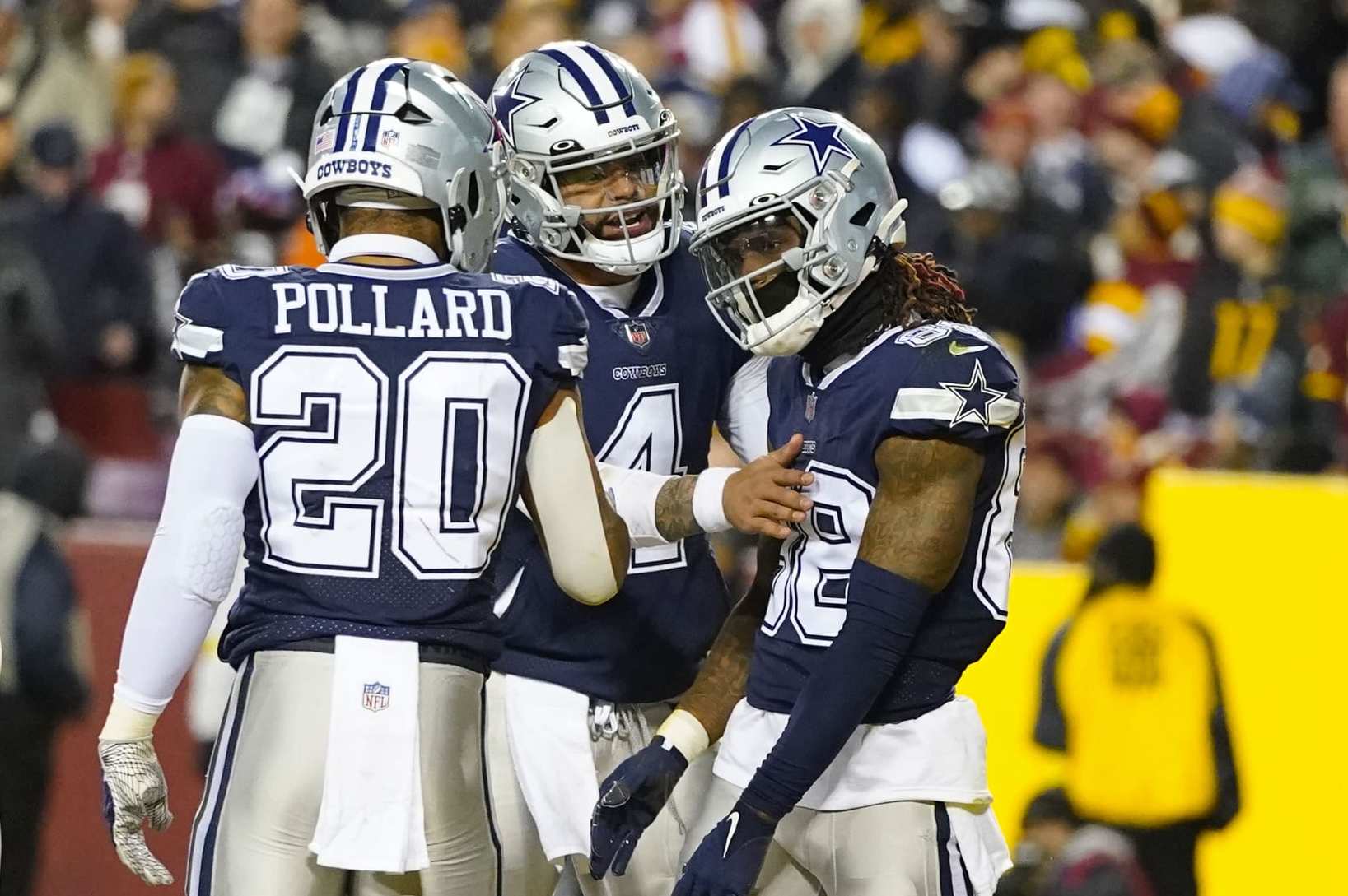 Minnesota Vikings tight end T.J. Hockenson (87) looks to catch a pass ahead  of Dallas Cowboys safety Donovan Wilson (6) during the first half of an NFL  football game, Sunday, Nov. 20