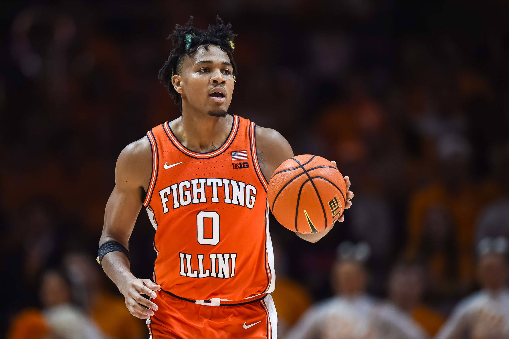 KNOXVILLE, TN - DECEMBER 09: Illinois Fighting Illini guard Terrence Shannon Jr. (0) brings the ball up court during the college basketball game between the Tennessee Volunteers and the Illinois Fighting Illini on December 9, 2023, at Food City Center in Knoxville, TN. (Photo by Bryan Lynn/Icon Sportswire via Getty Images)