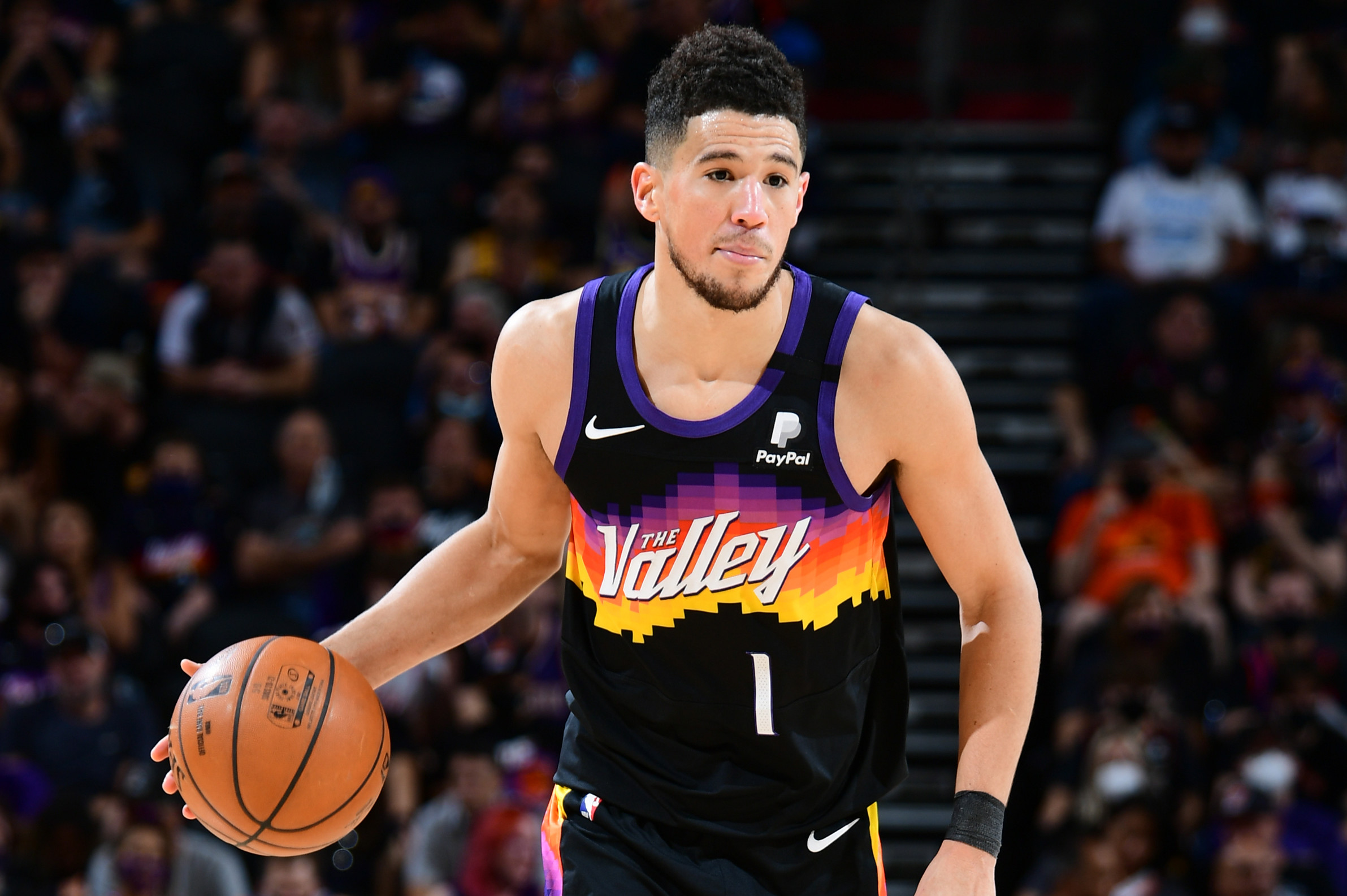 PHOENIX, AZ - MAY 23: Devin Booker #1 of the Phoenix Suns dribbles the ball against the Los Angeles Lakers during Round 1, Game 1 of the 2021 NBA Playoffs on May 23, 2021 at Phoenix Suns Arena in Phoenix, Arizona. NOTE TO USER: User expressly acknowledges and agrees that, by downloading and or using this photograph, user is consenting to the terms and conditions of the Getty Images License Agreement. Mandatory Copyright Notice: Copyright 2021 NBAE (Photo by Michael Gonzales/NBAE via Getty Images) PHOENIX, AZ - MAY 23: Devin Booker #1 of the Phoenix Suns dribbles the ball against the Los Angeles Lakers during Round 1, Game 1 of the 2021 NBA Playoffs on May 23, 2021 at Phoenix Suns Arena in Phoenix, Arizona. NOTE TO USER: User expressly acknowledges and agrees that, by downloading and or using this photograph, user is consenting to the terms and conditions of the Getty Images License Agreement. Mandatory Copyright Notice: Copyright 2021 NBAE (Photo by Michael Gonzales/NBAE via Getty Images)