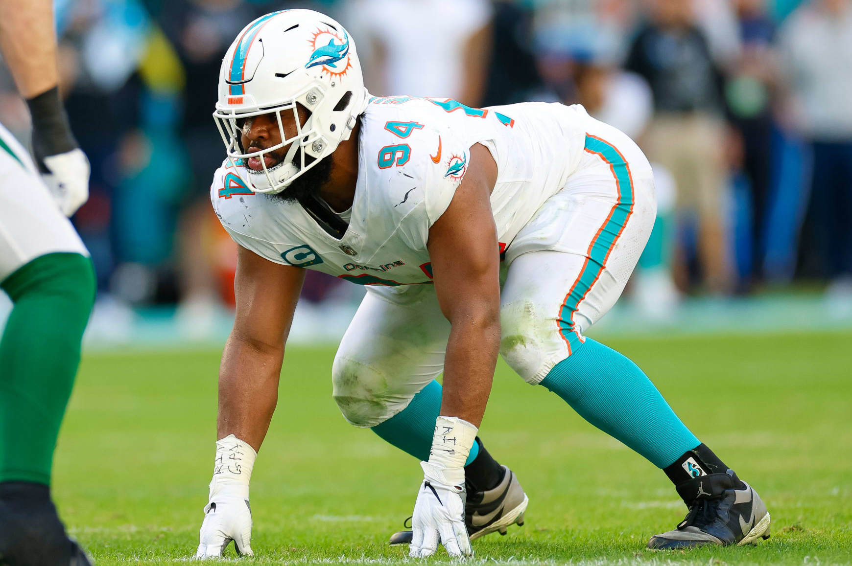 MIAMI GARDENS, FLORIDA - DECEMBER 17: Christian Wilkins #94 of the Miami Dolphins in a defensive stance during a game against the New York Jets at Hard Rock Stadium on December 17, 2023 in Miami Gardens, Florida. (Photo by Brandon Sloter/Image Of Sport/Getty Images)