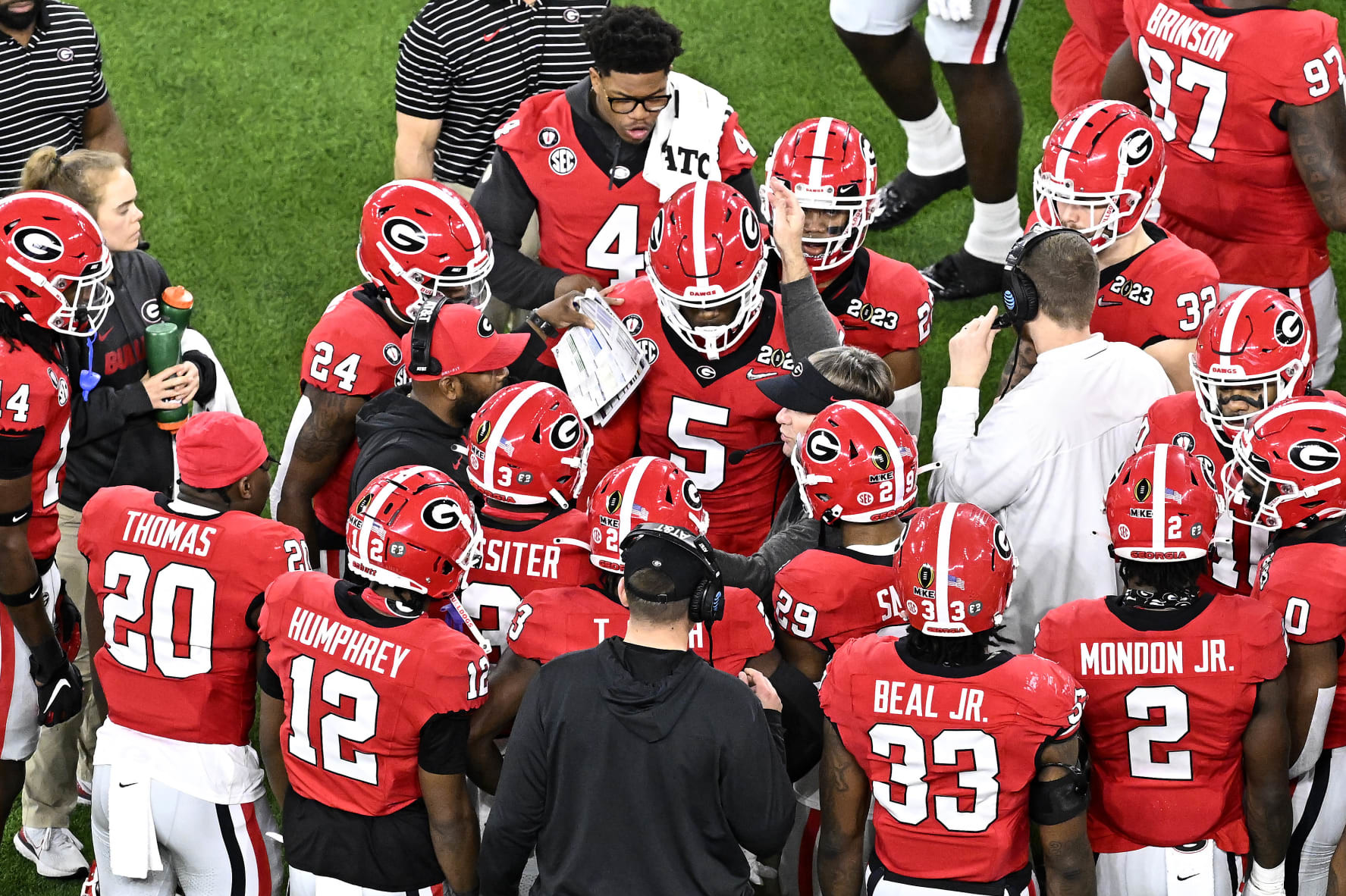INGLEWOOD, CALIFORNIA - JANUARY 09: Head coach Kirby Smart of the Georgia Bulldogs talks with Kelee Ringo #5 of the Georgia Bulldogs on the sideline during the first half against the TCU Horned Frogs in the College Football Playoff National Championship game at SoFi Stadium on January 09, 2023 in Inglewood, California. (Photo by Kevork Djansezian/Getty Images)