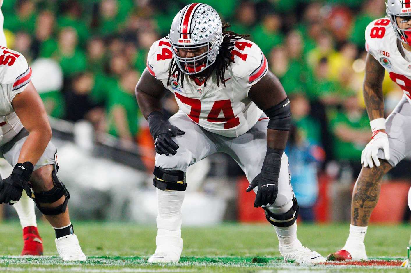 PASADENA, CALIFORNIA - JANUARY 1: Donovan Jackson #74 of the Ohio State Buckeyes in an offensive stance in the second half during the Rose Bowl against Oregon Ducks at Rose Bowl Stadium on January 1, 2025 in Pasadena, California. (Photo by Ric Tapia/Getty Images)