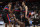 DETROIT, MI - DECEMBER 16: Isaiah Stewart #28 of the Detroit Pistons is helped up by teammates Alec Burks #5, Jalen Duren #0, and Bojan Bogdanovic #44 during the game against the Sacramento Kings on December 16, 2022 at Little Caesars Arena in Detroit, Michigan. NOTE TO USER: User expressly acknowledges and agrees that, by downloading and/or using this photograph, User is consenting to the terms and conditions of the Getty Images License Agreement. Mandatory Copyright Notice: Copyright 2022 NBAE (Photo by Brian Sevald/NBAE via Getty Images)