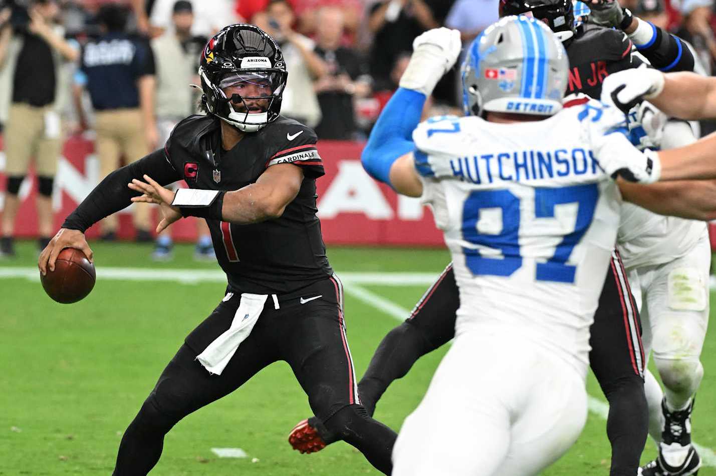 Detroit Lions defensive end Aidan Hutchison rushes Arizona Cardinals quarterback Kyler Murray. Detroit Lions defensive end Aidan Hutchison rushes Arizona Cardinals quarterback Kyler Murray.