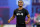 INDIANAPOLIS, INDIANA - MARCH 02: Adonai Mitchell #WO19 of Texas participates in the 40-yard dash during the NFL Combine at Lucas Oil Stadium on March 02, 2024 in Indianapolis, Indiana. (Photo by Stacy Revere/Getty Images)