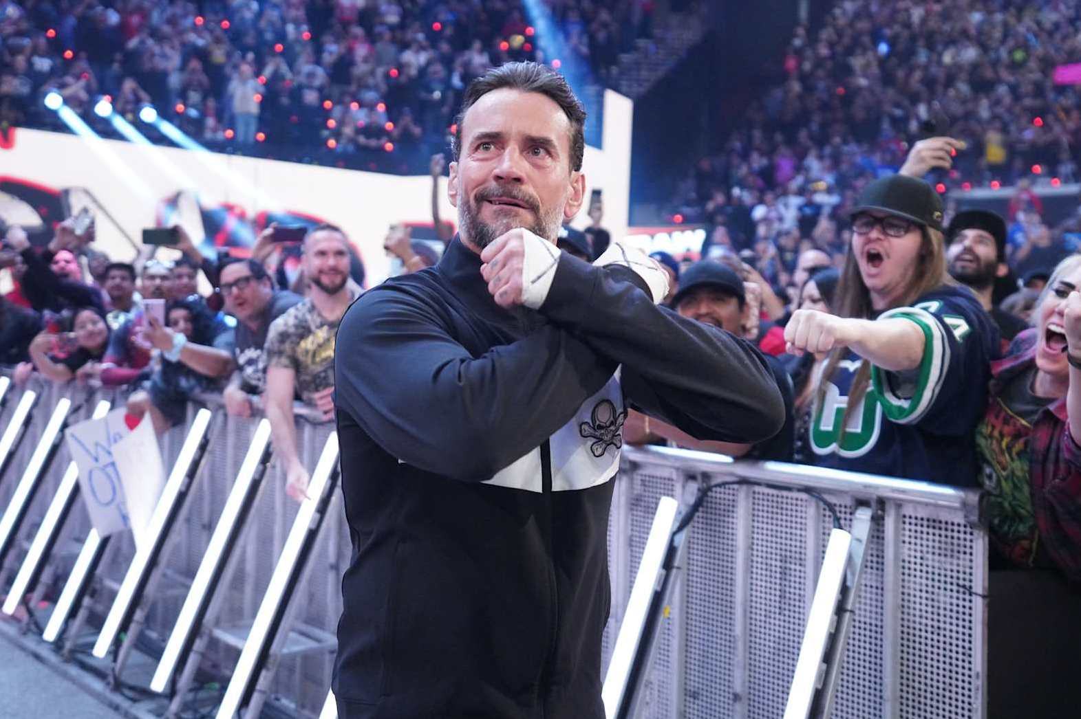 INGLEWOOD, CALIFORNIA - JANUARY 06: CM Punk makes his way to the ring during Monday Night RAW at Intuit Dome on January 6, 2025 in Inglewood, California.  (Photo by WWE/Getty Images)