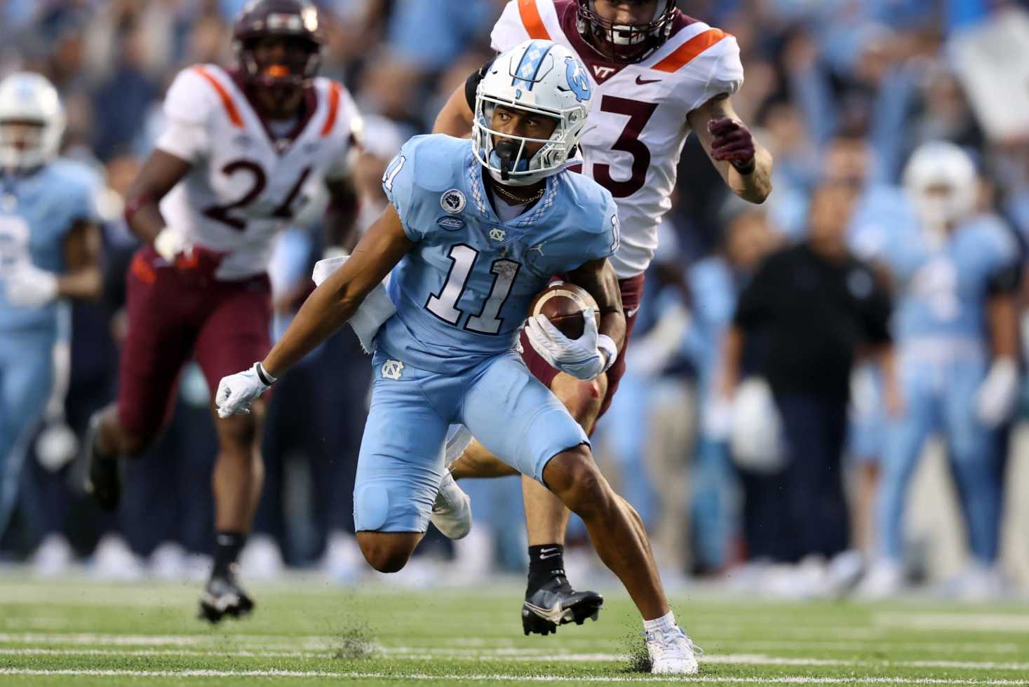 CHAPEL HILL, NC - OCTOBER 1: Josh Downs #11 of the University North Carolina runs with the ball during a game between Virginia Tech and North Carolina at Kenan Memorial Stadium on October 1, 2022 in Chapel HIll, North Carolina. (Photo by Andy Mead/ISI Photos/Getty Images)