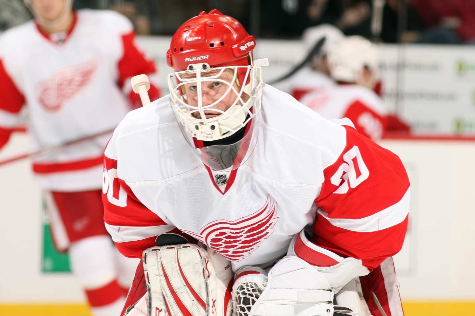 DENVER, CO - DECEMBER 27: Goaltender Chris Osgood #30 of the Detroit Red Wings makes a save against the Colorado Avalanche at the Pepsi Center on December 27, 2010 in Denver, Colorado. The Red Wings went on to win 4-3 in overtime as goaltender Chris Osgood claimed his 400th career win. (Photo by Michael Martin/NHLI via Getty Images)
