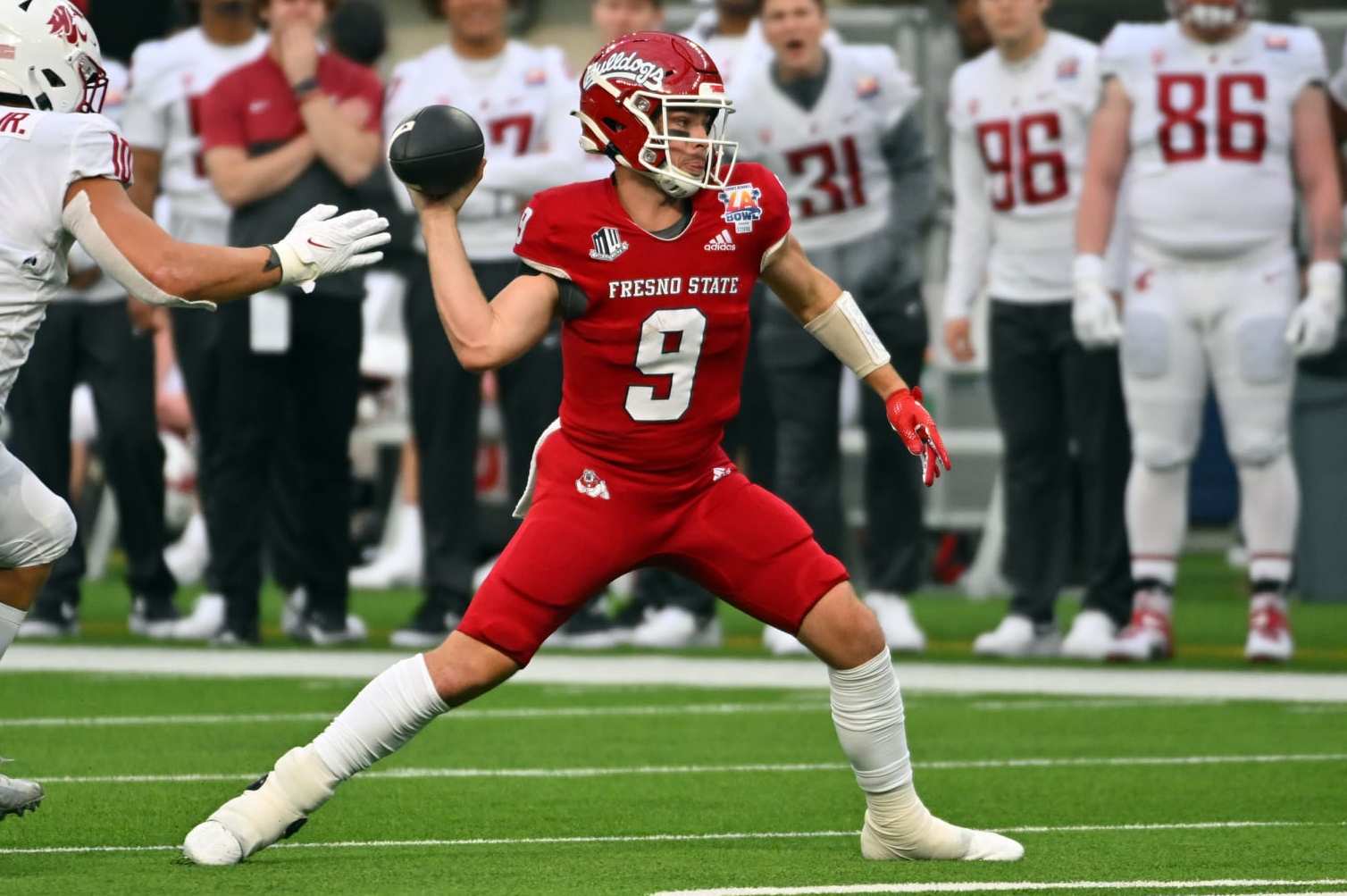 INGLEWOOD, CA - DECEMBER 17: Quarterback Jake Haener #9 of the Fresno State Bulldogs throws a pass against the Washington State Cougars during the first half of the Jimmy Kimmel LA Bowl Presented by Stifel at SoFi Stadium on December 17, 2022 in Inglewood, California. (Photo by Kevork Djansezian/Getty Images)