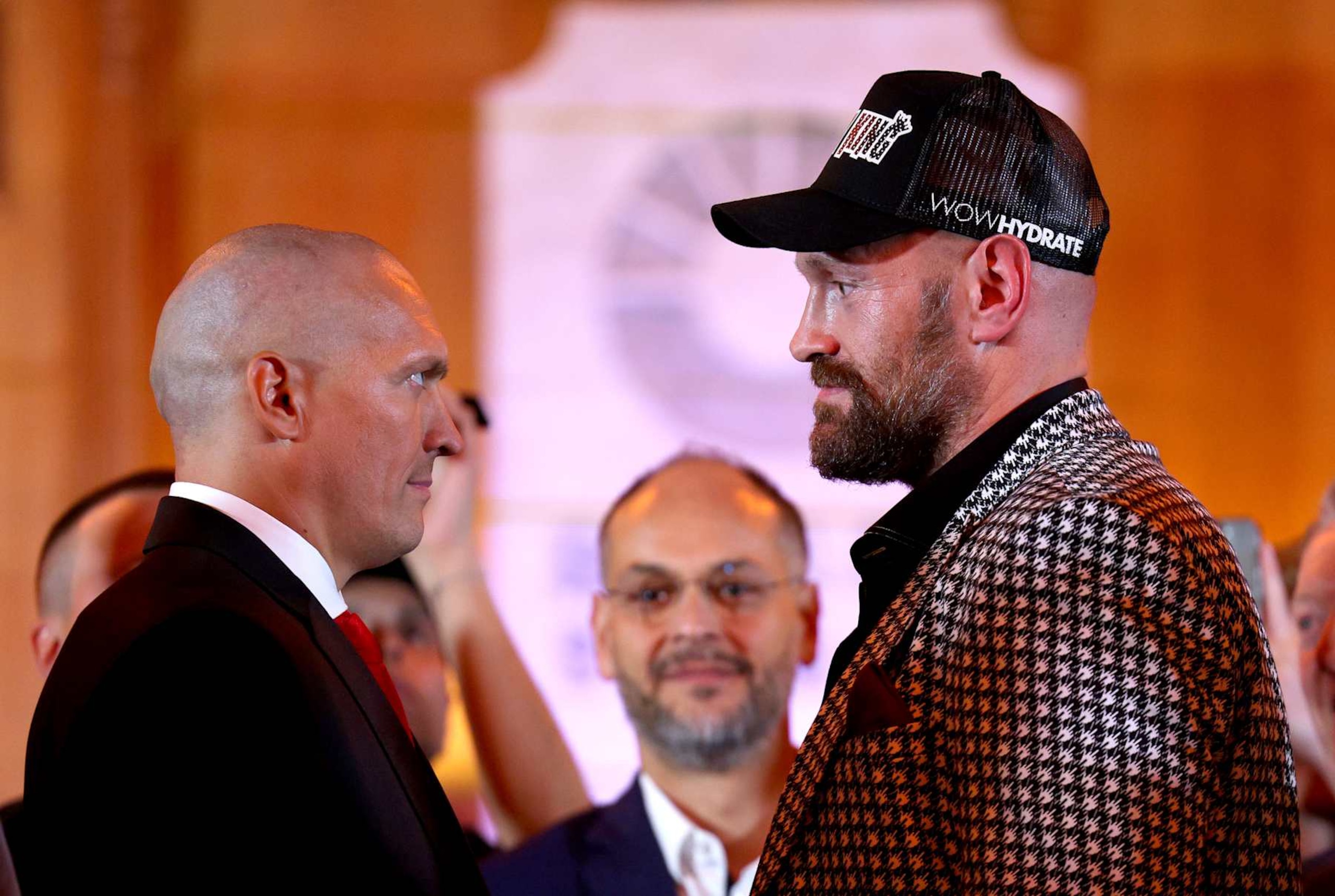 LONDON, ENGLAND - OCTOBER 23: Oleksandr Usyk and Tyson Fury face off during the Usyk v Fury 2 Press Conference ahead of their IBO, WBC and WBO World Heavyweight titles' fight at Guildhall on October 23, 2024 in London, England. (Photo by Andrew Redington/Getty Images)