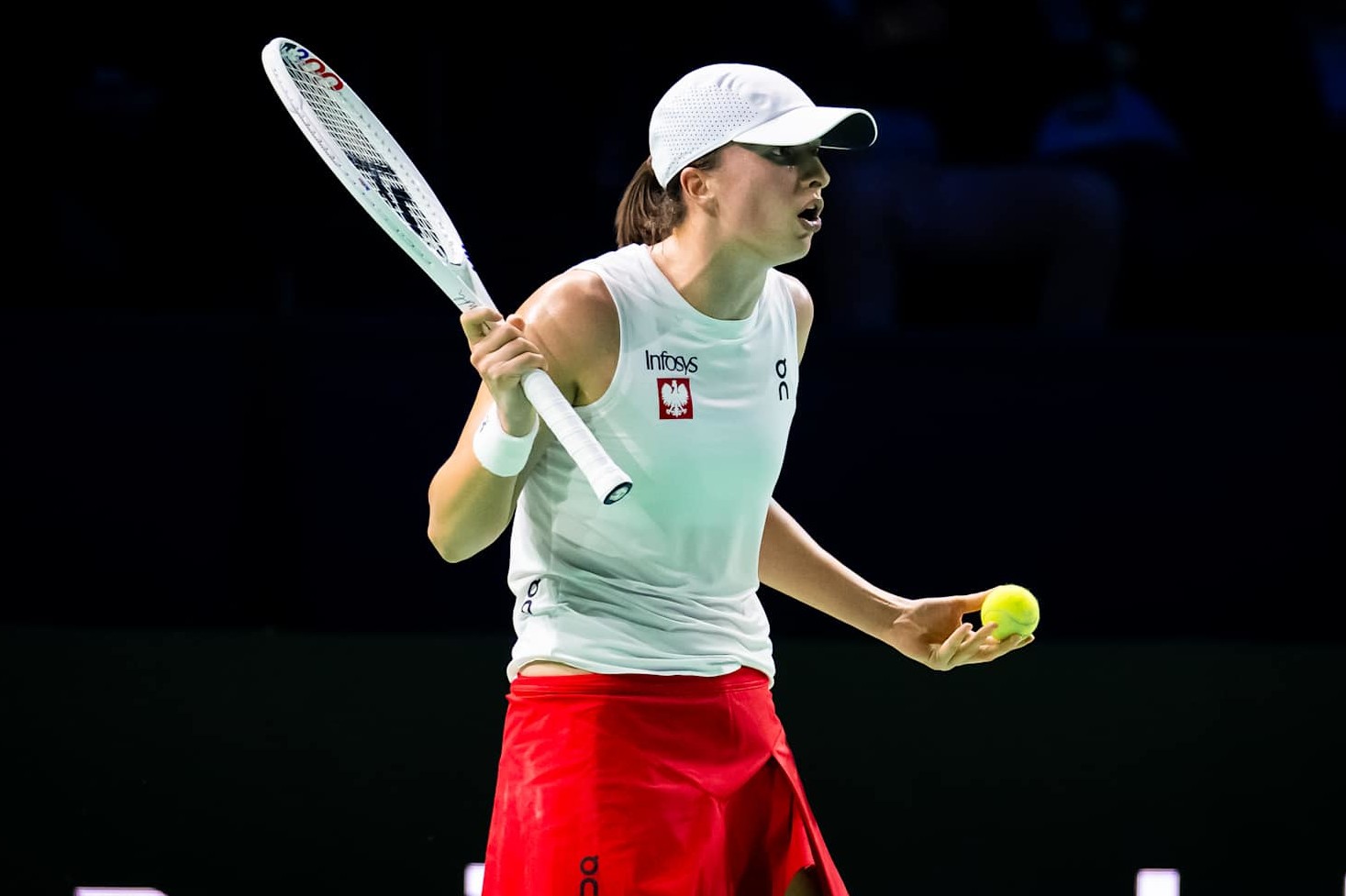 MALAGA, SPAIN - NOVEMBER 18: Iga Swiatek of Poland reacts while playing against Jasmine Paolini of Italy during the Billie Jean King Cup Finals semi-final match between Poland and Italy at Palacio de Deportes Jose Maria Martin Carpena on November 18, 2024 in Malaga, Spain (Photo by Robert Prange/Getty Images)