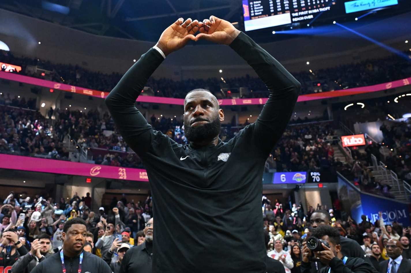 CLEVELAND, OHIO - NOVEMBER 25: LeBron James #23 of the Los Angeles Lakers acknowledges the fans during a tribute video during the first quarter against the Cleveland Cavaliers at Rocket Mortgage Fieldhouse on November 25, 2023 in Cleveland, Ohio. NOTE TO USER: User expressly acknowledges and agrees that, by downloading and or using this photograph, User is consenting to the terms and conditions of the Getty Images License Agreement. (Photo by Jason Miller/Getty Images)