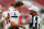 TAMPA, FL - AUGUST 14: Tom Brady (12) of the Buccaneers talks with Referee Adrian Hill (29) before the preseason game between the Cincinnati Bengals and the Tampa Bay Buccaneers on August 14, 2021 at Raymond James Stadium in Tampa, Florida. (Photo by Cliff Welch/Icon Sportswire via Getty Images)