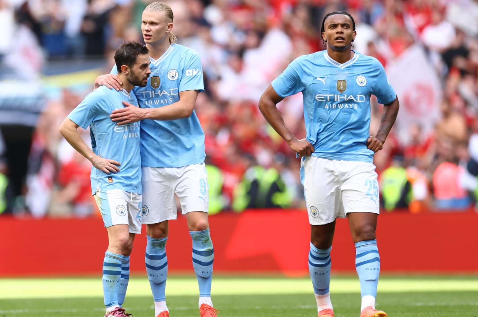 LONDON, ENGLAND - MAY 25: L-R Bernardo Silva, Erling Haaland and Manuel Akanji of Manchester City look dejected after full time during the Emirates FA Cup Final match between Manchester City and Manchester United at Wembley Stadium on May 25, 2024 in London, England.(Photo by Jacques Feeney/Offside/Offside via Getty Images)
