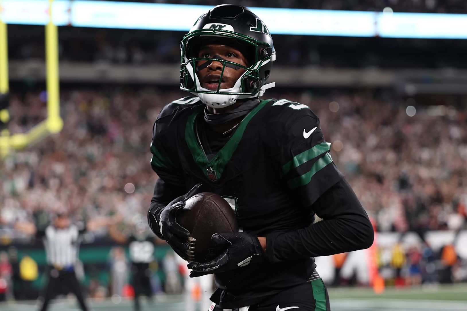 EAST RUTHERFORD, NEW JERSEY - OCTOBER 31: Garrett Wilson #5 of the New York Jets celebrates a touchdown during the fourth quarter against the Houston Texans at MetLife Stadium on October 31, 2024 in East Rutherford, New Jersey. (Photo by Luke Hales/Getty Images)