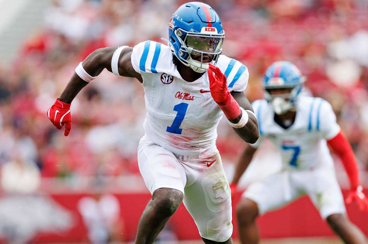 FAYETTEVILLE, ARKANSAS - NOVEMBER 02: Princely Umanmielen #1 of the Ole Miss Rebels at the line of scrimmage during a game against the Arkansas Razorbacks at Donald W. Reynolds Razorback Stadium on November 02, 2024 in Fayetteville, Arkansas. The Rebels defeated the Razorbacks 63-31. (Photo by Wesley Hitt/Getty Images)