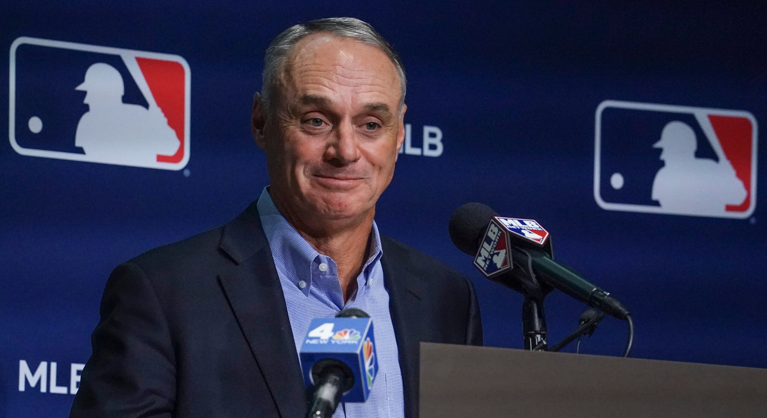 Baseball Commissioner Rob Manfred holds a news conference after baseball players and owners voted to approve a new labor agreement, Thursday March 10, 2022, in New York. “I am genuinely thrilled to say Major League Baseball is back and we're going to play 162 games,” Manfred said. “I want to start by apologizing to our fans. I know the last few months have been difficult.” (AP Photo/Bebeto Matthews)