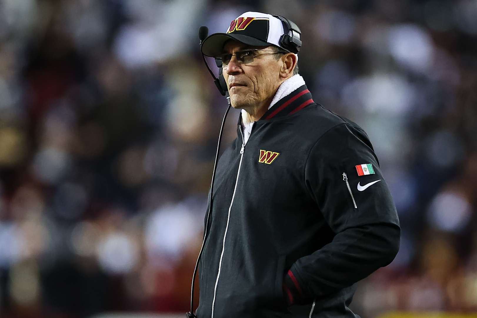 LANDOVER, MD - JANUARY 07: Head coach Ron Rivera of the Washington Commanders looks on against the Dallas Cowboys during the first half of the game at FedExField on January 7, 2024 in Landover, Maryland. (Photo by Scott Taetsch/Getty Images)