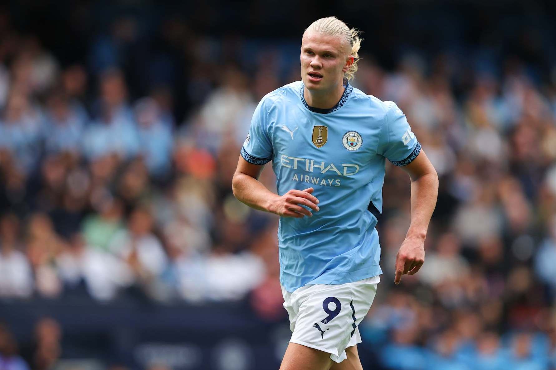 MANCHESTER, ENGLAND - SEPTEMBER 14: Erling Haaland of Manchester City during the Premier League match between Manchester City FC and Brentford FC at Etihad Stadium on September 14, 2024 in Manchester, England. (Photo by James Gill - Danehouse/Getty Images)