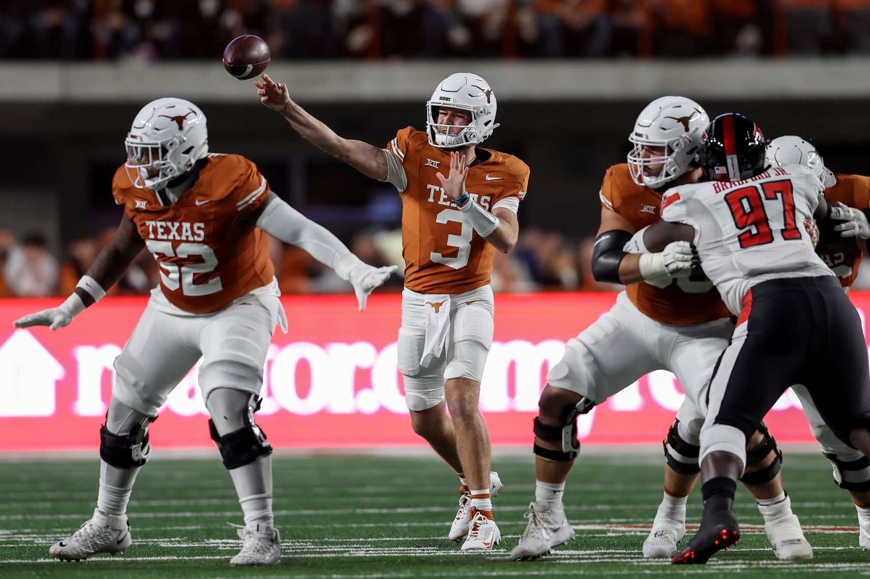 AUSTIN, TEXAS - NOVEMBER 24: Quinn Ewers #3 of the Texas Longhorns throws a pass in the first half against the Texas Tech Red Raiders at Darrell K Royal-Texas Memorial Stadium on November 24, 2023 in Austin, Texas. (Photo by Tim Warner/Getty Images)