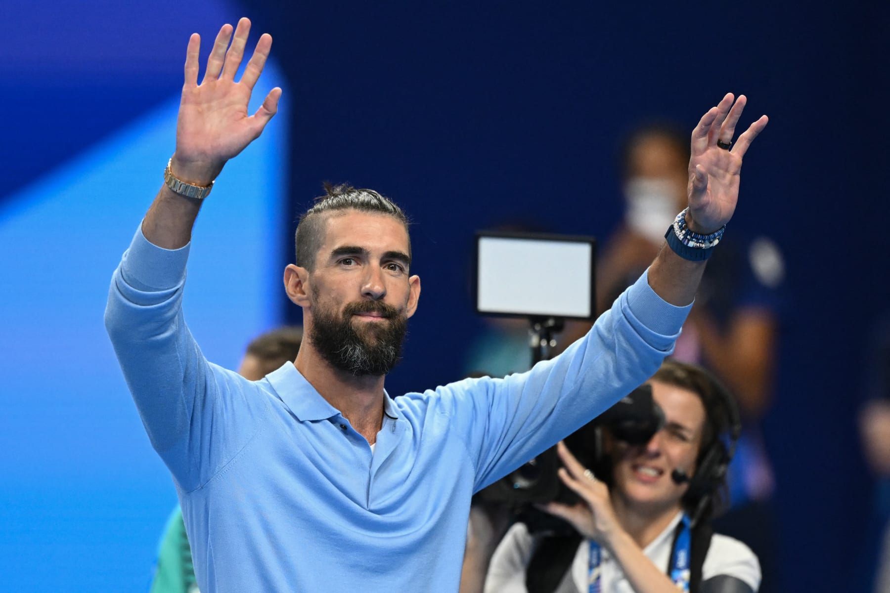 Former US swimmer Michael Phelps attends the swimming event during the Paris 2024 Olympic Games at the Paris La Defense Arena in Nanterre, west of Paris, on July 28, 2024. (Photo by SEBASTIEN BOZON / AFP) (Photo by SEBASTIEN BOZON/AFP via Getty Images)