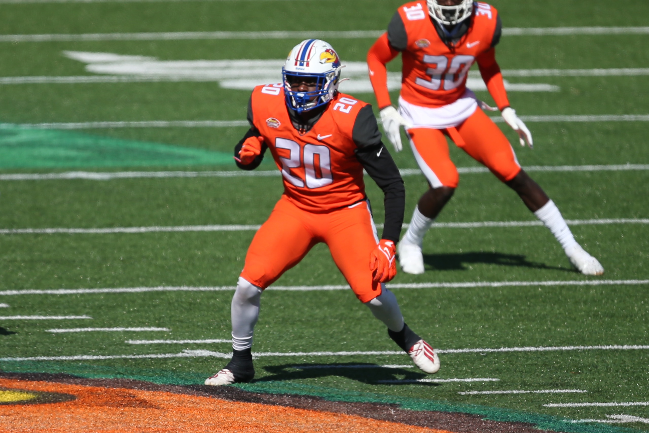 MOBILE, AL - FEBRUARY 05: National linebacker Kyron Johnson of Kansas (20) during the Reese's Senior Bowl on February 5, 2022 at Hancock Whitney Stadium in Mobile, Alabama. (Photo by Michael Wade/Icon Sportswire via Getty Images) MOBILE, AL - FEBRUARY 05: National linebacker Kyron Johnson of Kansas (20) during the Reese's Senior Bowl on February 5, 2022 at Hancock Whitney Stadium in Mobile, Alabama. (Photo by Michael Wade/Icon Sportswire via Getty Images)