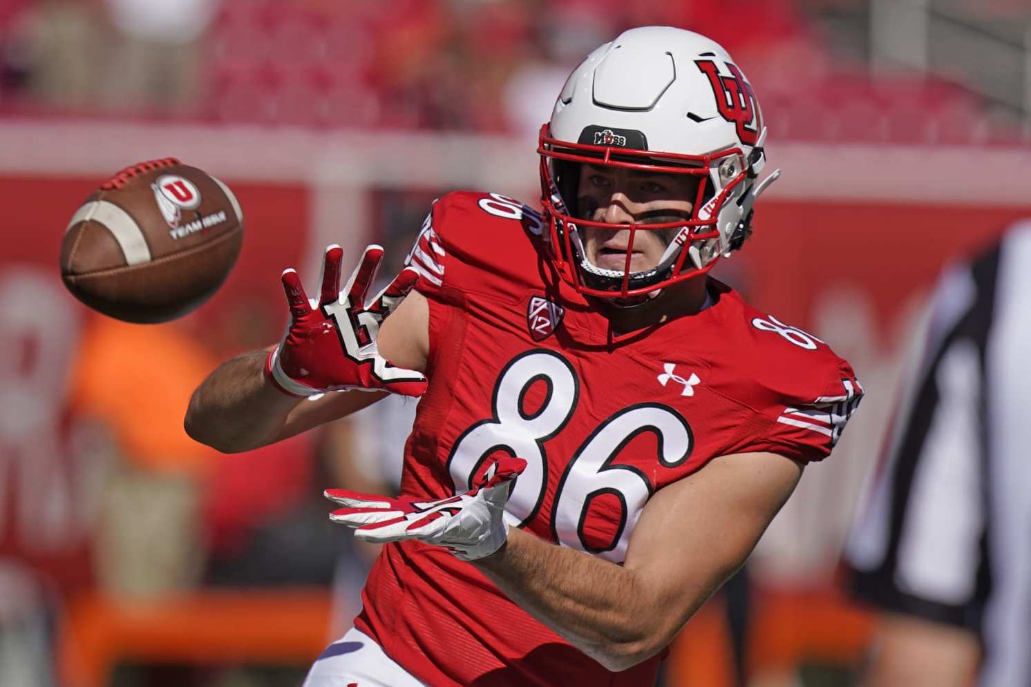 Utah tight end Dalton Kincaid (86) warms up before their NCAA college football game against Oregon State Saturday, Oct. 1, 2022, in Salt Lake City. (AP Photo/Rick Bowmer)