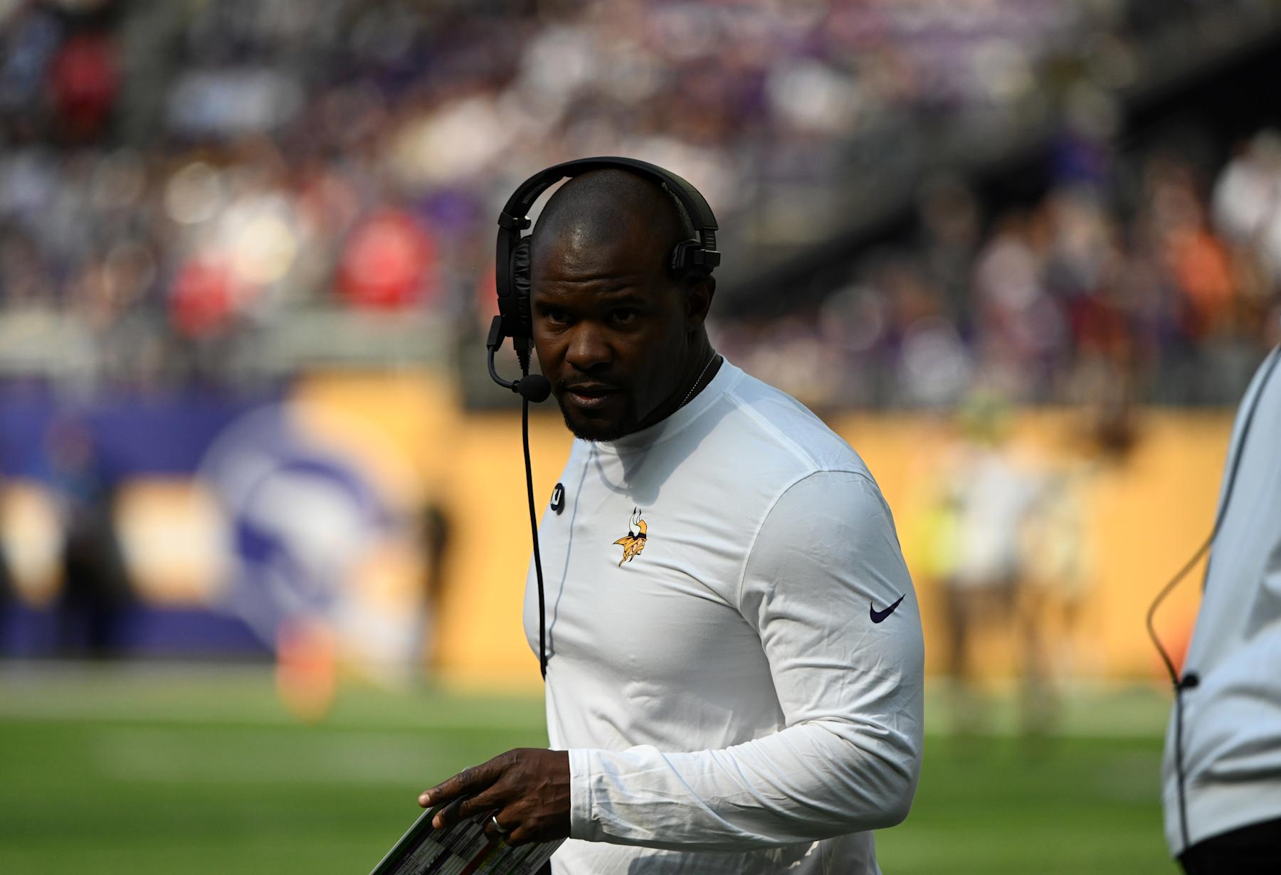 MINNEAPOLIS, MN - SEPTEMBER 22: Minnesota Vikings assistant coach Brian Flores watches action during the NFL game between the Houston Texans and the Minnesota Vikings on September 22, 2024, at U.S. Bank Stadium in Minneapolis, MN. (Photo by John Rivera/Icon Sportswire via Getty Images)