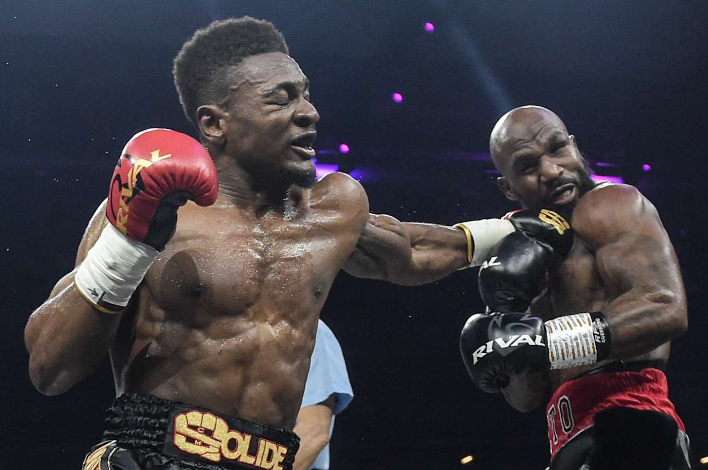France's Christian Mbilli (R) fights USA's Vaughn Alexander (L) during their middleweight fight at the Parc des Expositions de la Beaujoire in Nantes, western France, on December 17, 2022. (Photo by Sebastien SALOM-GOMIS / AFP) (Photo by SEBASTIEN SALOM-GOMIS/AFP via Getty Images)