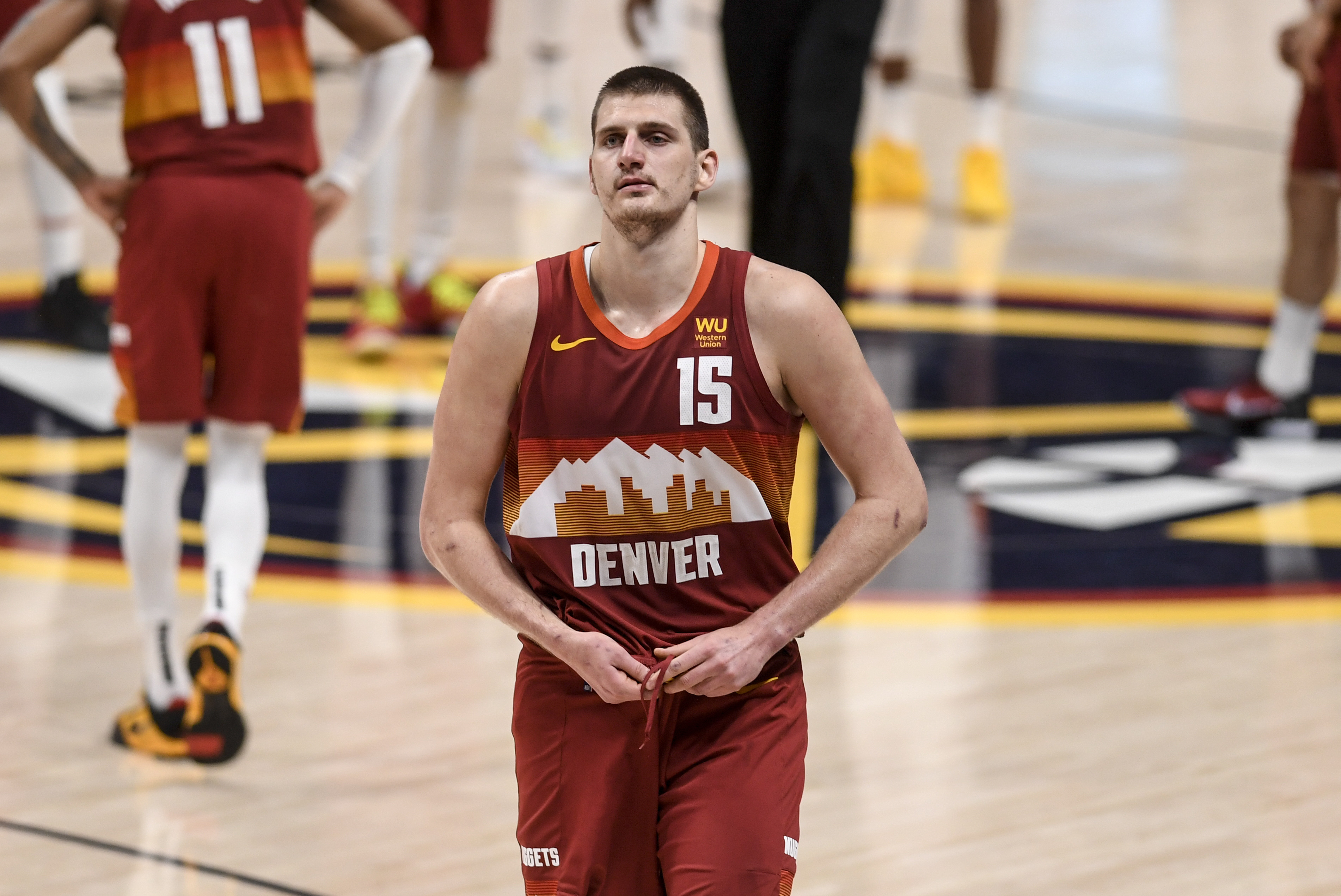DENVER, CO - JUNE 13: Nikola Jokic (15) of the Denver Nuggets leaves the floor after being ejected following a flagrant foul he committed on Cameron Payne (15) of the Phoenix Suns during the third quarter at Ball Arena on Sunday, June 13, 2021. The Denver Nuggets hosted the Phoenix Suns for game four of their best-of-seven NBA Playoffs series. (Photo by AAron Ontiveroz/MediaNews Group/The Denver Post via Getty Images) DENVER, CO - JUNE 13: Nikola Jokic (15) of the Denver Nuggets leaves the floor after being ejected following a flagrant foul he committed on Cameron Payne (15) of the Phoenix Suns during the third quarter at Ball Arena on Sunday, June 13, 2021. The Denver Nuggets hosted the Phoenix Suns for game four of their best-of-seven NBA Playoffs series. (Photo by AAron Ontiveroz/MediaNews Group/The Denver Post via Getty Images)