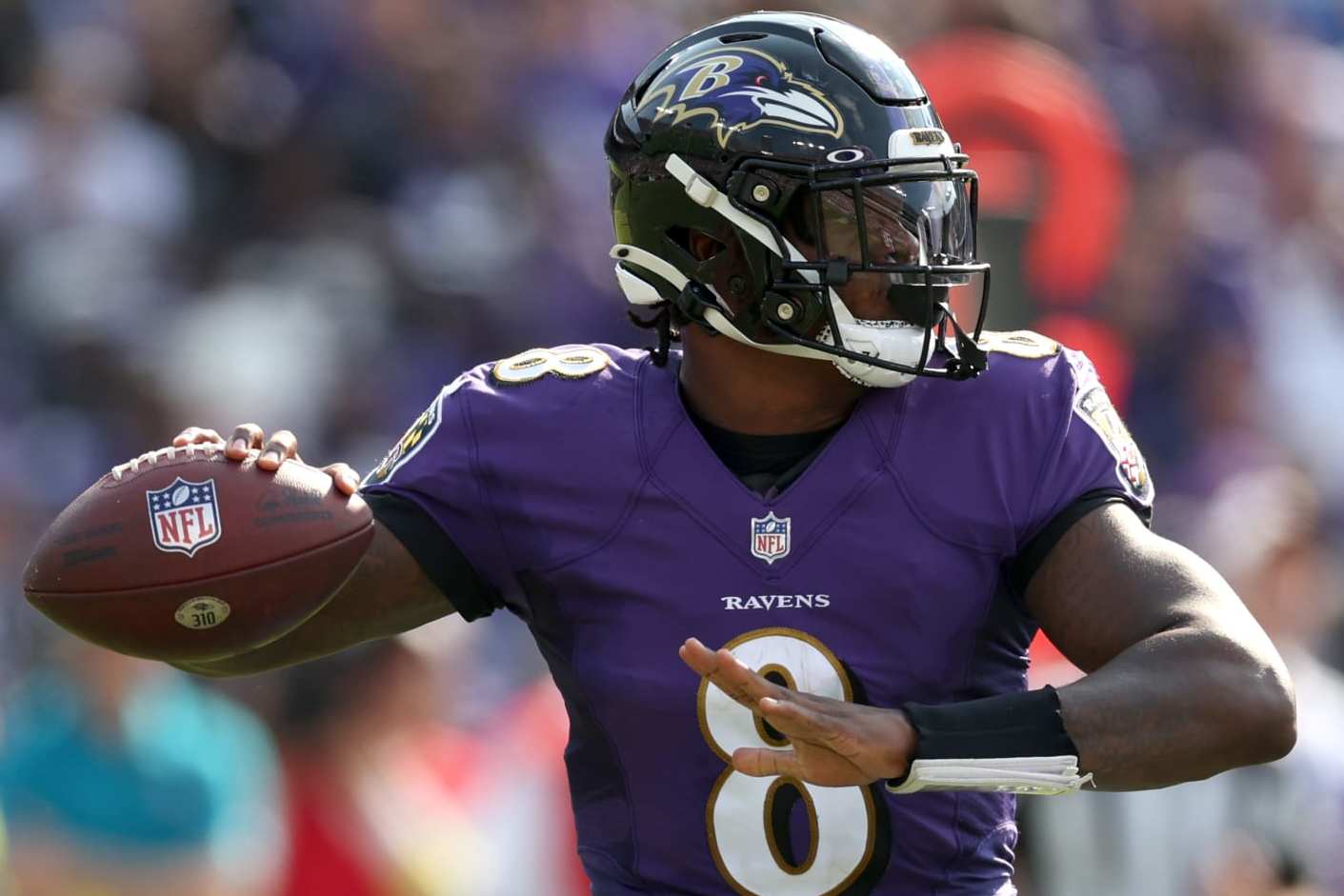 BALTIMORE, MARYLAND - SEPTEMBER 18: Quarterback Lamar Jackson #8 of the Baltimore Ravens throws a second half pass 	against the Miami Dolphins at M&T Bank Stadium on September 18, 2022 in Baltimore, Maryland. (Photo by Rob Carr/Getty Images)