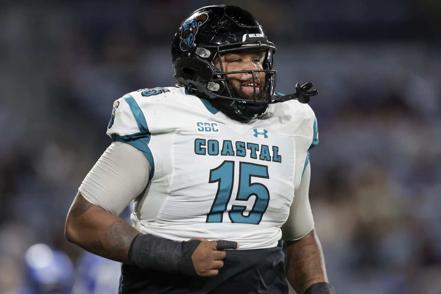 Coastal Carolina nose tackle Jerrod Clark (15) runs during the first half of an NCAA football game against Georgia State on Thursday, Sept. 22, 2022, in Atlanta. (AP Photo/Stew Milne)