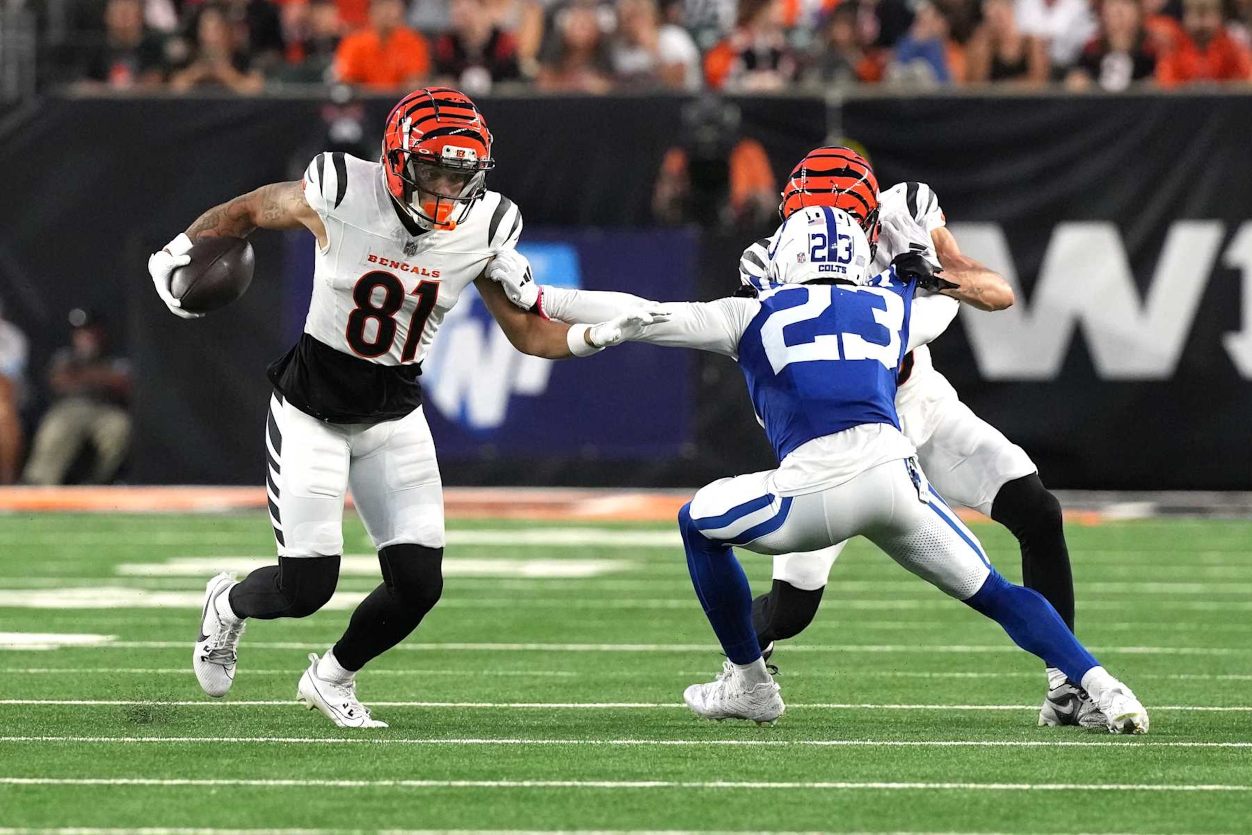 CINCINNATI, OHIO - AUGUST 22: Wide receiver Jermaine Burton #81 of the Cincinnati Bengals carries the ball during the first quarter of the preseason game against the Indianapolis Colts at Paycor Stadium on August 22, 2024 in Cincinnati, Ohio. (Photo by Jason Mowry/Getty Images) CINCINNATI, OHIO - AUGUST 22: Wide receiver Jermaine Burton #81 of the Cincinnati Bengals carries the ball during the first quarter of the preseason game against the Indianapolis Colts at Paycor Stadium on August 22, 2024 in Cincinnati, Ohio. (Photo by Jason Mowry/Getty Images)