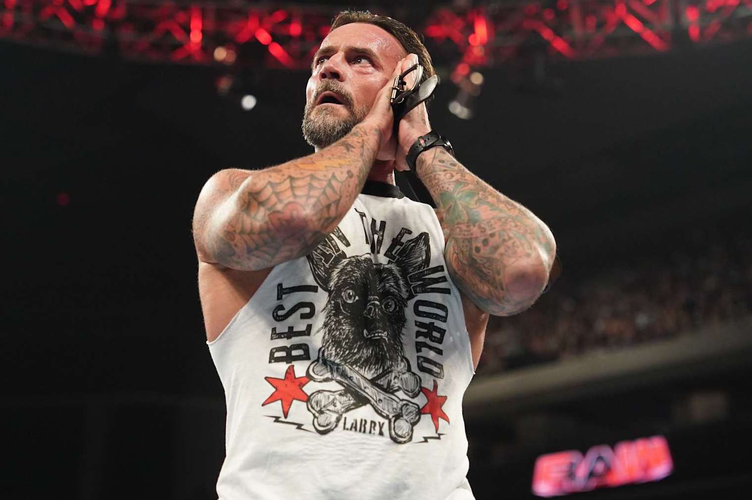AUSTIN, TEXAS - AUGUST 12: CM Punk teases a GTS during Monday Night RAW at Moody Center on August 12, 2024 in Austin, Texas.  (Photo by WWE/Getty Images)