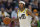 Utah Jazz guard Jordan Clarkson (00) brings the ball up court during the second half of an NBA preseason basketball game against the San Antonio Spurs Tuesday, Oct. 11, 2022, in Salt Lake City. (AP Photo/Rick Bowmer)