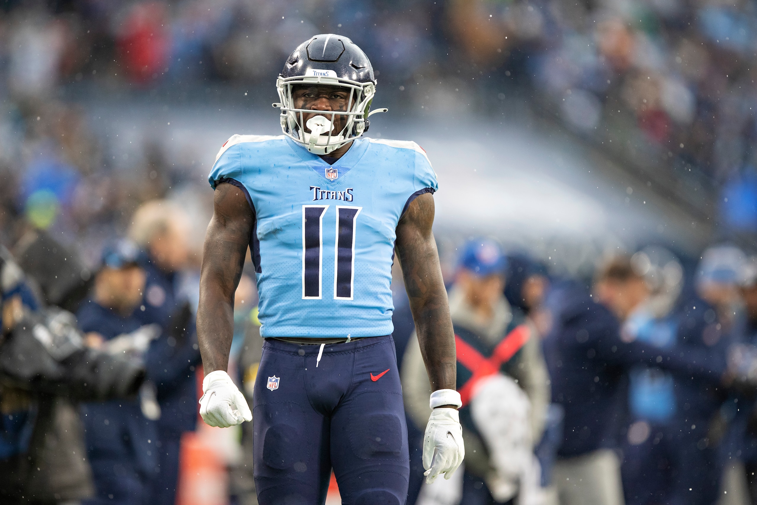 NASHVILLE, TENNESSEE - JANUARY 2:  A.J. Brown #11 of the Tennessee Titans celebrates after catching a pass during a game against the Miami Dolphins at Nissan Stadium on January 2, 2022 in Nashville, Tennessee.  The Titans defeated the Dolphins 34-3.  (Photo by Wesley Hitt/Getty Images)