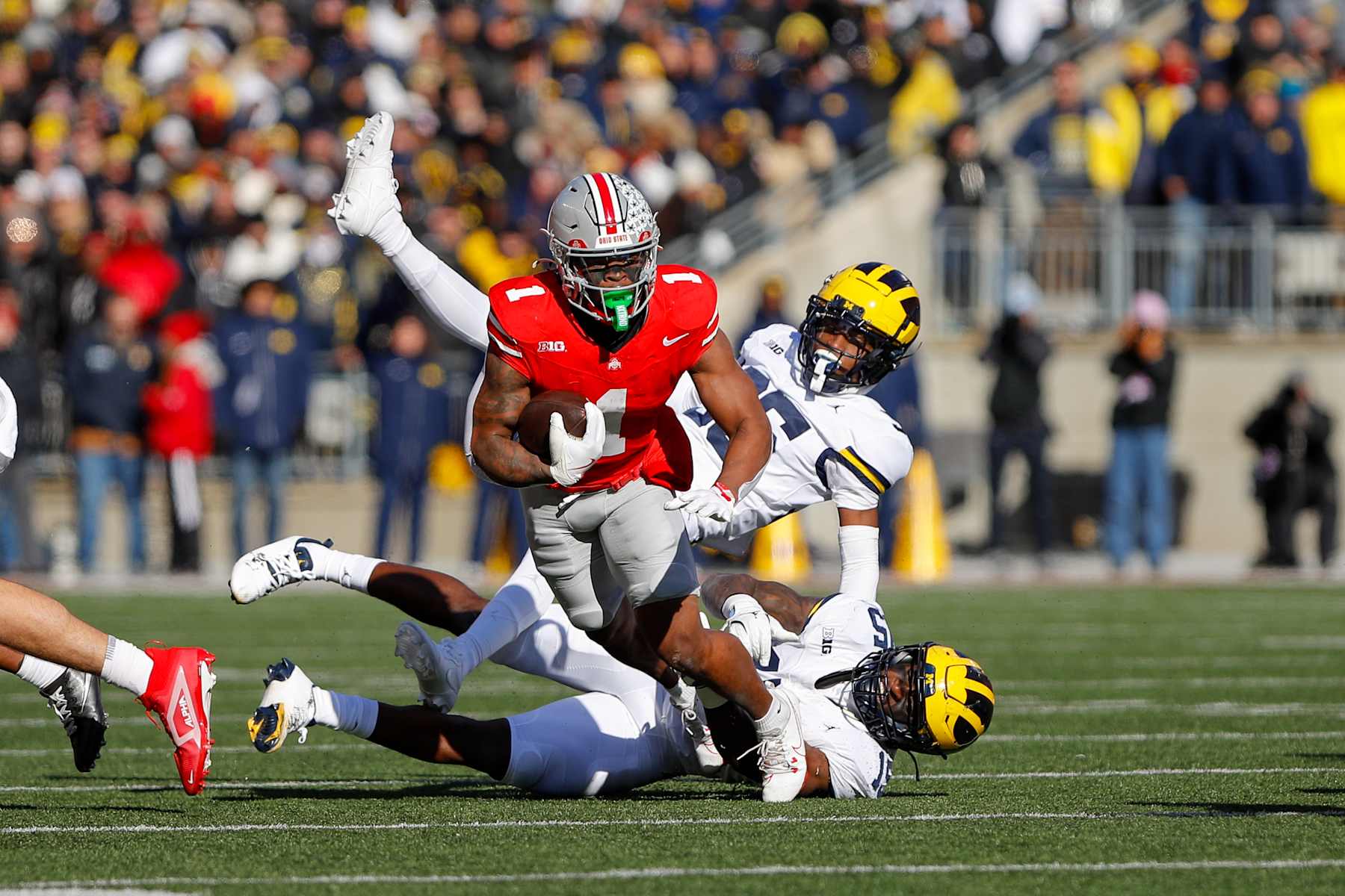 COLUMBUS, OH - NOVEMBER 30: Ohio State Buckeyes running back Quinshon Judkins (1) carries the ball during the game against the Michigan Wolverines and the Ohio State Buckeyes on November 30, 2024, at Ohio Stadium in Columbus, OH. (Photo by Ian Johnson/Icon Sportswire via Getty Images)