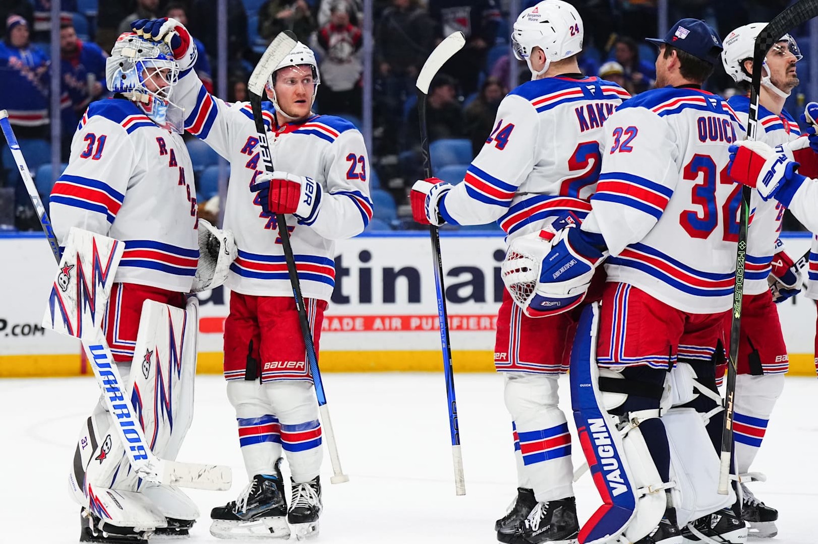 BUFFALO, NEW YORK - DECEMBER 11: (L-R) Igor Shesterkin #31, Adam Fox #23, Kaapo Kakko #24 and Jonathan Quick #32 of the New York Rangers celebrate their win after an NHL game against the Buffalo Sabres on December 11, 2024 at KeyBank Center in Buffalo, New York. (Photo by Chris Conaway Jr./NHLI via Getty Images)