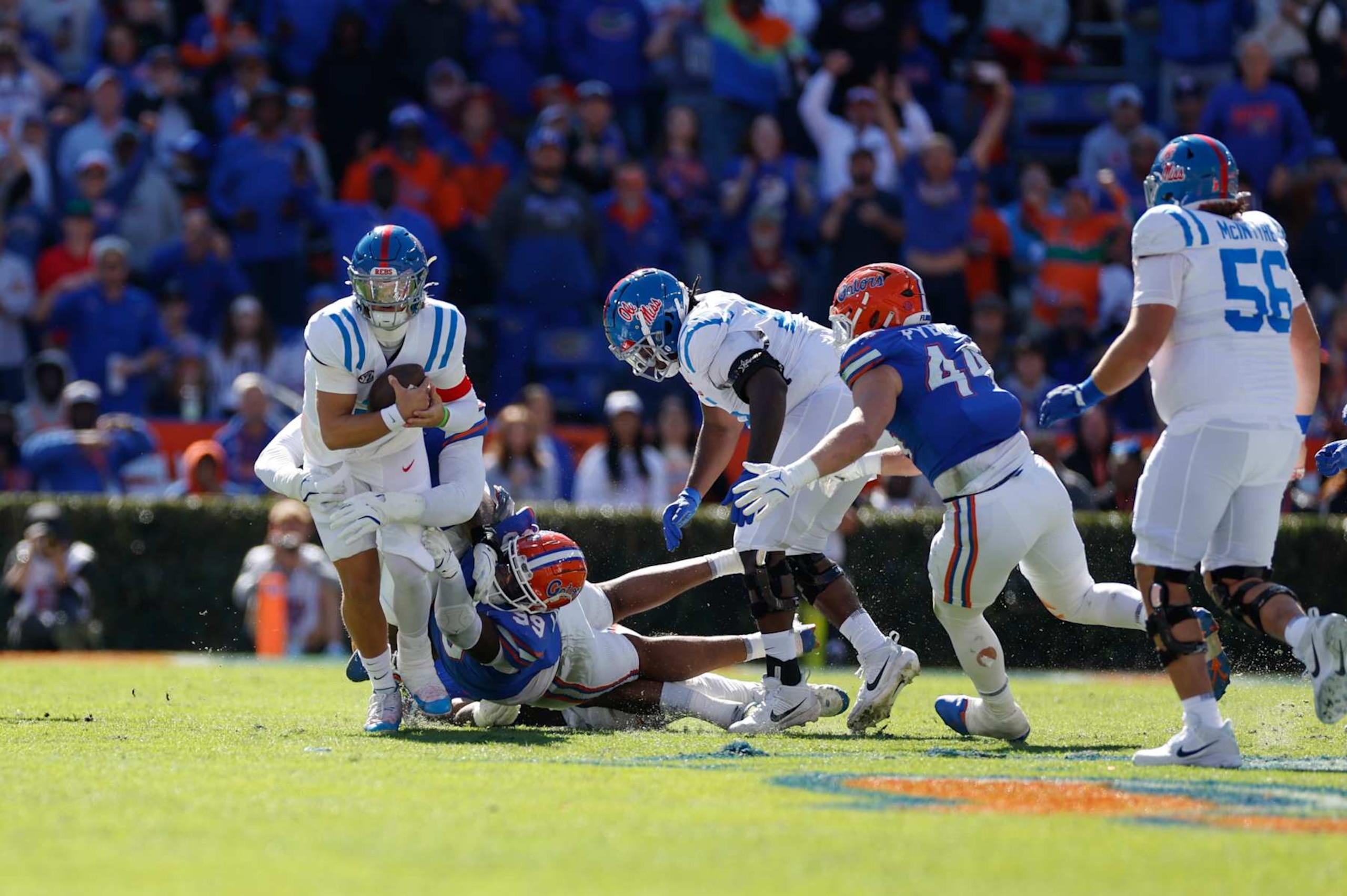 GAINESVILLE, FL - NOVEMBER 23: Mississippi Rebels quarterback Jaxson Dart (2) runs with the ball during the game between the Florida Gators and the Mississippi Rebels on November 23, 2024 at Ben Hill Griffin Stadium at Florida Field in Gainesville, Fl. (Photo by David Rosenblum/Icon Sportswire via Getty Images)