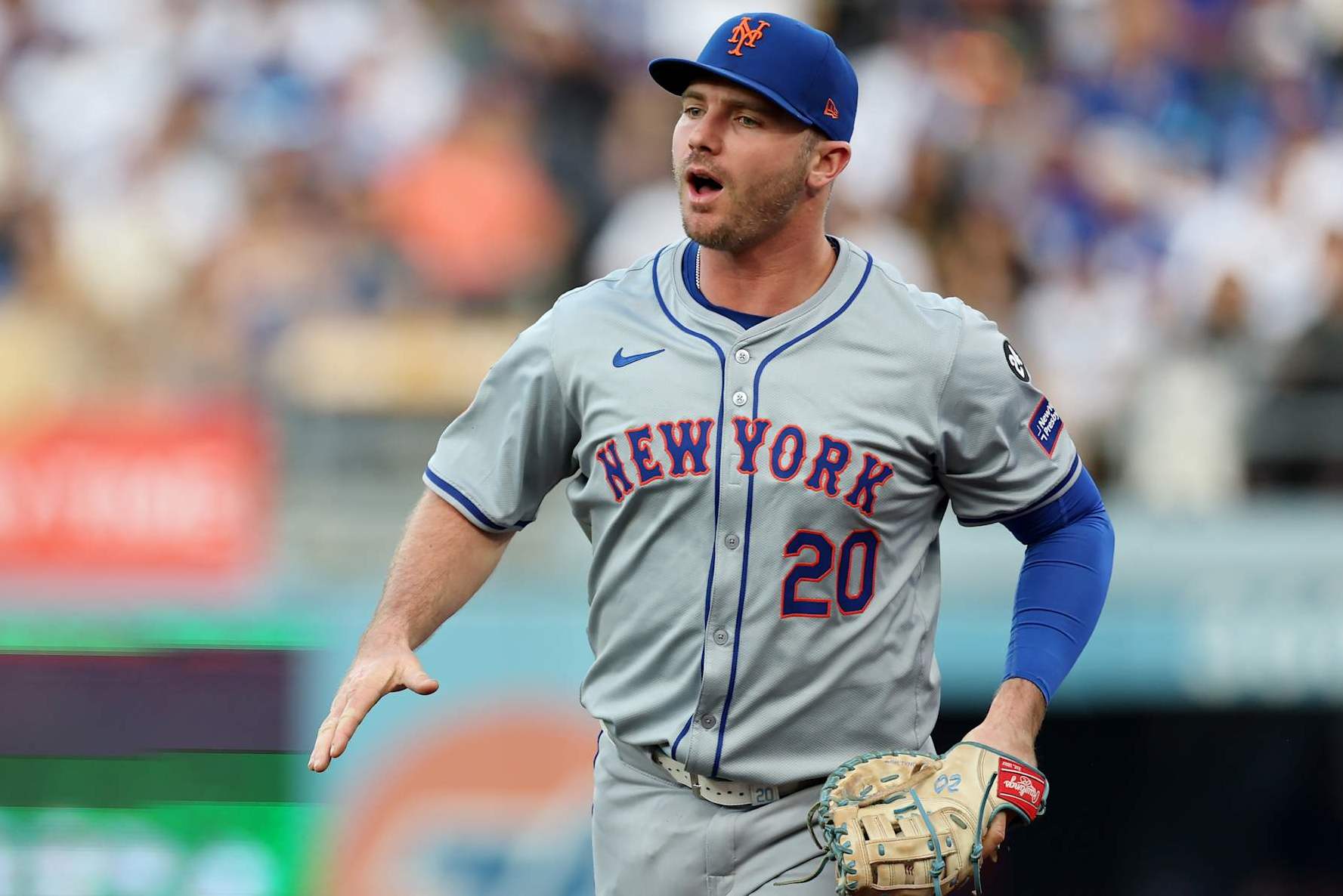 LOS ANGELES, CALIFORNIA - OCTOBER 20:  Pete Alonso #20 of the New York Mets reacts after catching a pop fly in foul territory to end the 1st inning during Game Six of the National League Championship Series against the Los Angeles Dodgers at Dodger Stadium on October 20, 2024 in Los Angeles, California. (Photo by Harry How/Getty Images)