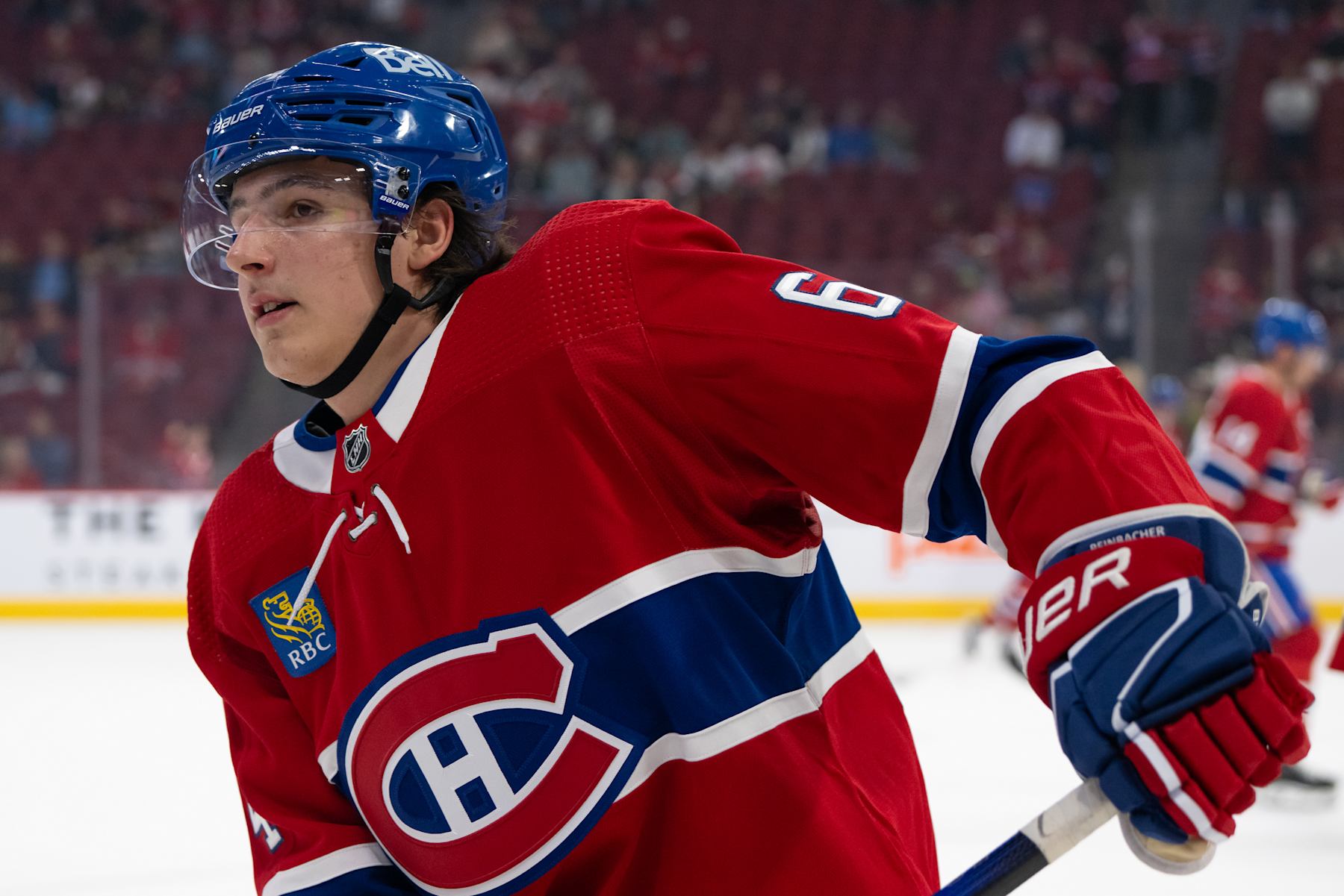 MONTREAL, QC - SEPTEMBER 30: David Reinbacher (64) of the Montreal Canadiens looks on during the warmup period of the NHL pre-season game between the Toronto Maple Leafs and the Montreal Canadiens on September 30, 2023, at the Bell Centre in Montreal, QC(Photo by Vincent Ethier/Icon Sportswire via Getty Images)