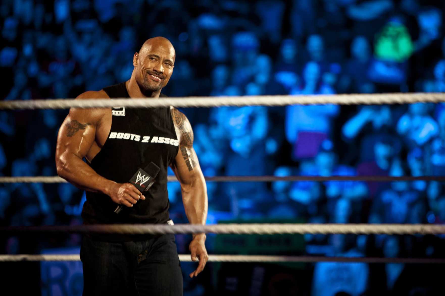 The Rock returns to WWE Smackdown and punishes Austin Theory - AS USA