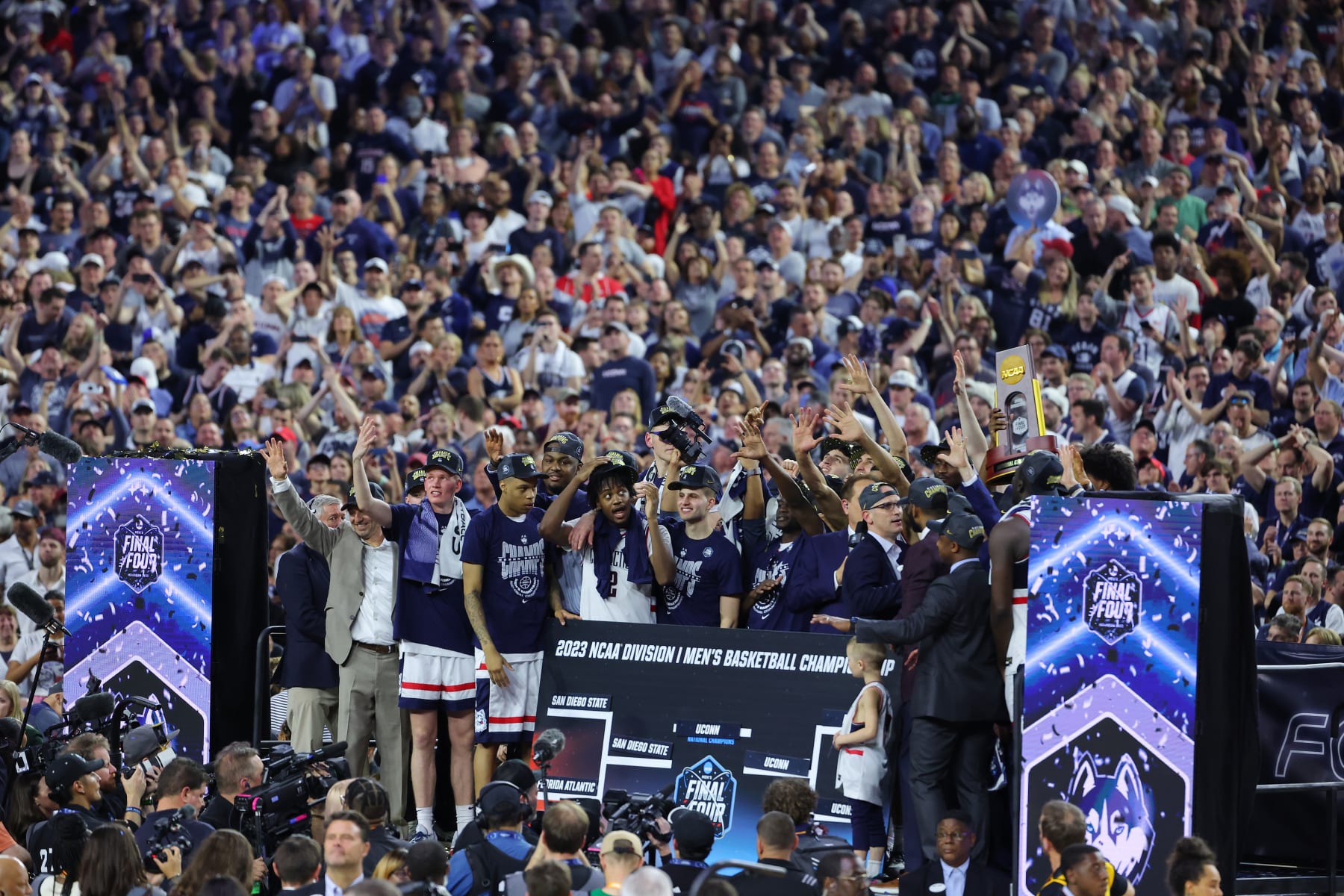 HOUSTON, TEXAS - APRIL 03: The Connecticut Huskies celebrate after defeating the San Diego State Aztecs to win the NCAA Men's Basketball Tournament National Championship at NRG Stadium on April 03, 2023 in Houston, Texas. (Photo by C. Morgan Engel/NCAA Photos via Getty Images)