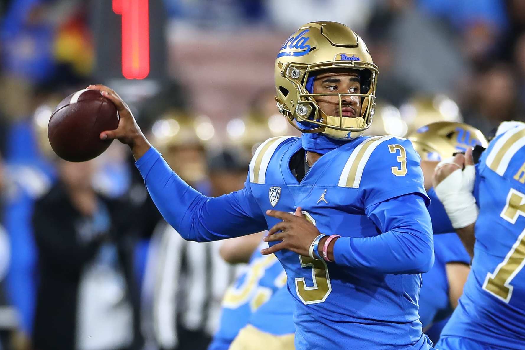 PASADENA, CA - NOVEMBER 25: UCLA Bruins quarterback Dante Moore (3) throws a pass during Cal Bears game versus the UCLA Bruins in the last Pac-12 Conference football game played on November 25, 2023, at the Rose Bowl Stadium in Pasadena, CA. (Photo by Jevone Moore/Icon Sportswire via Getty Images)