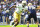 Notre Dame defensive lineman Isaiah Foskey (7) in action during the first half of an NCAA college football game against Navy, Saturday, Nov. 12, 2022, in Baltimore. (AP Photo/Terrance Williams)