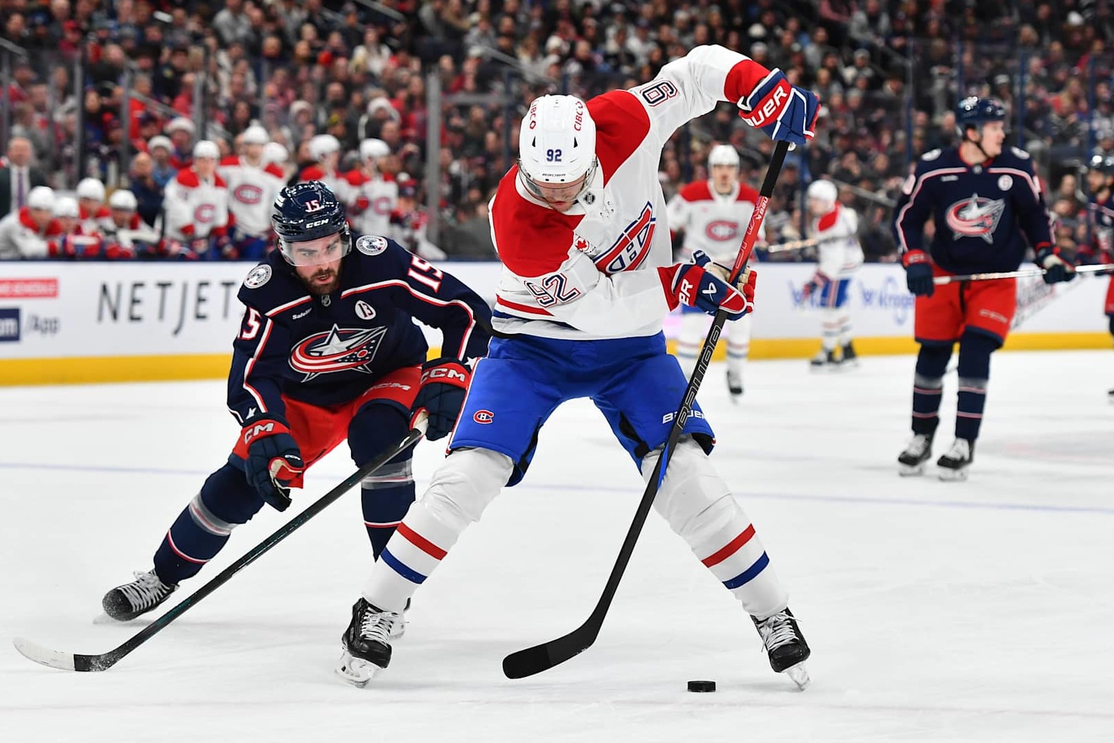 COLUMBUS, OHIO - DECEMBER 23: Patrik Laine #92 of the Montreal Canadiens skates with the puck as Dante Fabbro #15 of the Columbus Blue Jackets defends during the first period of a game at Nationwide Arena on December 23, 2024 in Columbus, Ohio. (Photo by Ben Jackson/Getty Images)