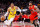 TORONTO, ON - DECEMBER 07: Russell Westbrook #0 of the Los Angeles Lakers dribbles against Gary Trent Jr. #33 of the Toronto Raptors during the second half of their NBA game at Scotiabank Arena on December 7, 2022 in Toronto, Canada. NOTE TO USER: User expressly acknowledges and agrees that, by downloading and or using this photograph, User is consenting to the terms and conditions of the Getty Images License Agreement. (Photo by Cole Burston/Getty Images)