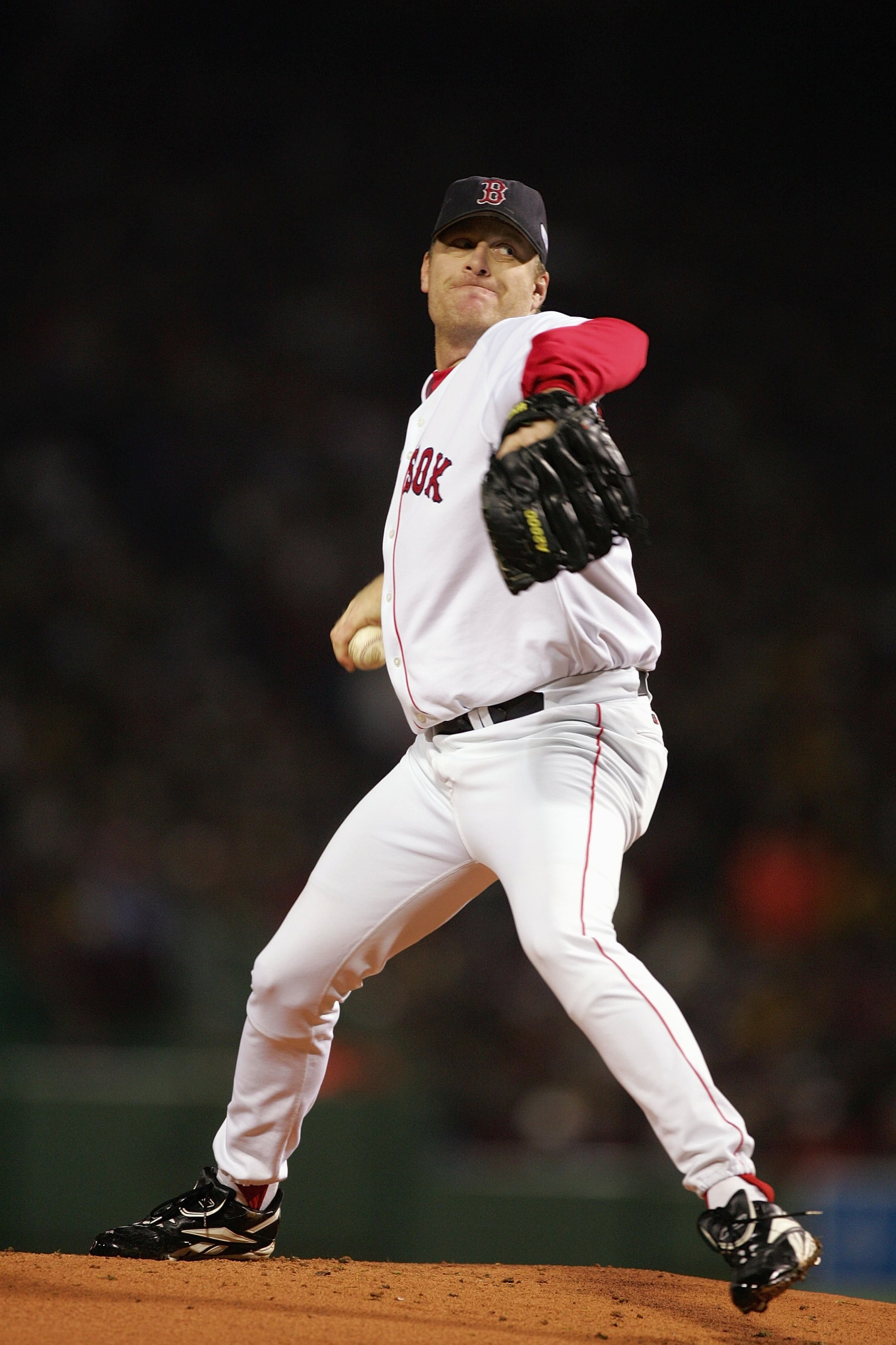BOSTON - OCTOBER 24:  Curt Schilling #38 of the Boston Red Sox pitches against the St. Louis Cardinals during game two of the 2004 World Series on October 24, 2004 at Fenway Park in Boston, Massachusetts. (Photo by Ezra Shaw/Getty Images)
