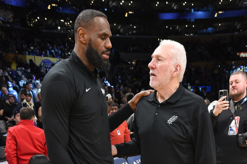 LOS ANGELES, CA - FEBRUARY 23: LeBron James #23 of the Los Angeles Lakers & Head Coach Gregg Popovich of the San Antonio Spurs embrace after the game on February 23, 2024 at Crypto.Com Arena in Los Angeles, California. NOTE TO USER: User expressly acknowledges and agrees that, by downloading and/or using this Photograph, user is consenting to the terms and conditions of the Getty Images License Agreement. Mandatory Copyright Notice: Copyright 2024 NBAE (Photo by Andrew D. Bernsteini/NBAE via Getty Images)