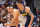 DENVER, COLORADO - NOVEMBER 26: Zach Collins #23 of the San Antonio Spurs and Michael Porter Jr. #1 of the Denver Nuggets set to rebound a foul shot in the first half at Ball Arena on November 26, 2023 in Denver, Colorado. NOTE TO USER: User expressly acknowledges and agrees that, by downloading and/or using this Photograph, user is consenting to the terms and conditions of the Getty Images License Agreement. (Photo by Justin Tafoya/Getty Images)